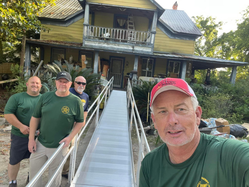 Sheriff Smith and team installing ramp